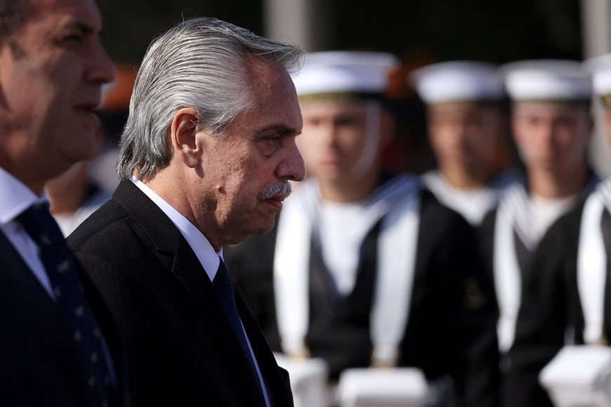 Argentina's President Alberto Fernandez walks past a honor guard during an official ceremony while meeting with Chile's President Gabriel Boric in Santiago, Chile, April 5, 2023. REUTERS/Ivan Alvarado