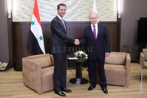 ELLITORAL_208695 |  Archivo El presidente sirio Bashar Al Assad junto a su homólogo ruso, Vladimir Putin.