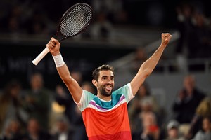 Tennis - French Open - Roland Garros, Paris, France - May 30, 2022 
Croatia's Marin Cilic celebrates after winning his fourth round match against Russia's Daniil Medvedev REUTERS/Dylan Martinez