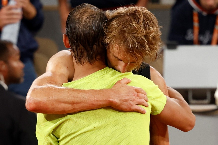 Tennis - French Open - Roland Garros, Paris, France - June 3, 2022
Germany's Alexander Zverev hugs Spain's Rafael Nadal as he retires from the match after sustaining an injury REUTERS/Yves Herman