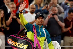 Tennis - French Open - Roland Garros, Paris, France - June 3, 2022
Spain's Rafael Nadal salutes fans after Germany's Alexander Zverev retires from the match after sustaining an injury REUTERS/Yves Herman