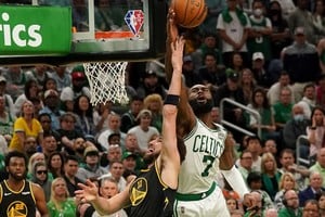 Jun 8, 2022; Boston, Massachusetts, USA; Boston Celtics guard Jaylen Brown (7) blocks a shot from Golden State Warriors guard Klay Thompson (11) in the second half during game three of the 2022 NBA Finals at TD Garden. Mandatory Credit: Kyle Terada-USA TODAY Sports