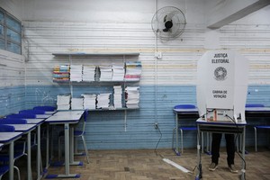 A person votes at a polling station during the presidential election in Porto Alegre, Brazil, October 2, 2022. REUTERS/Diego Vara
