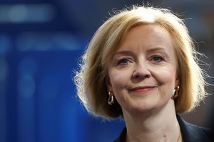 British Prime Minister Liz Truss walks during Britain's Conservative Party's annual conference in Birmingham, Britain, October 3, 2022. REUTERS/Hannah McKay