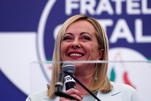 FILE PHOTO: Leader of Brothers of Italy Giorgia Meloni speaks at the party's election night headquarters, in Rome, Italy September 26, 2022. REUTERS/Guglielmo Mangiapane/File Photo