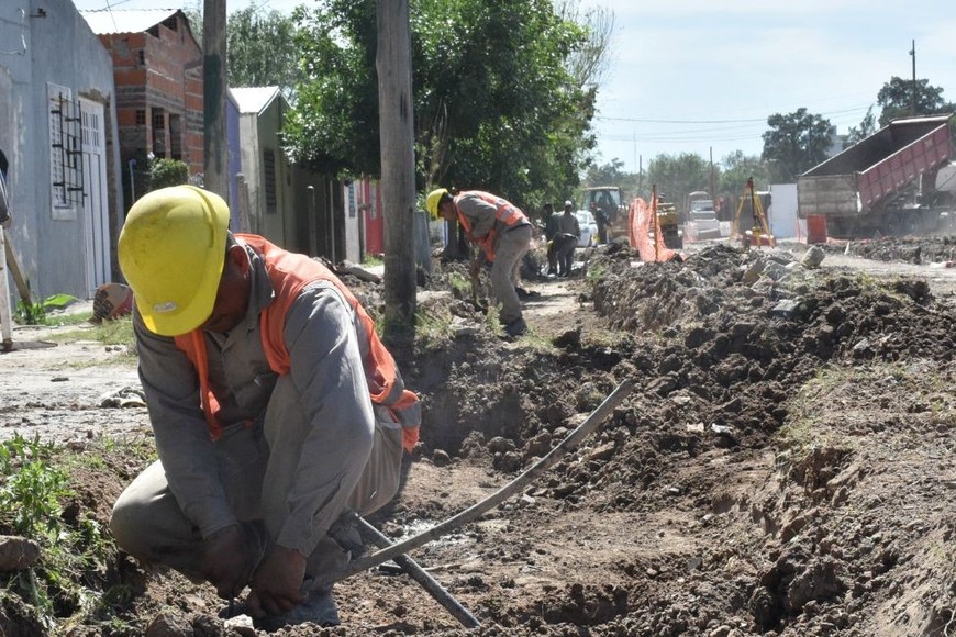 Operarios. Está lleno, por todo el barrio, en distintos frentes de obras. Crédito: Flavio Raina