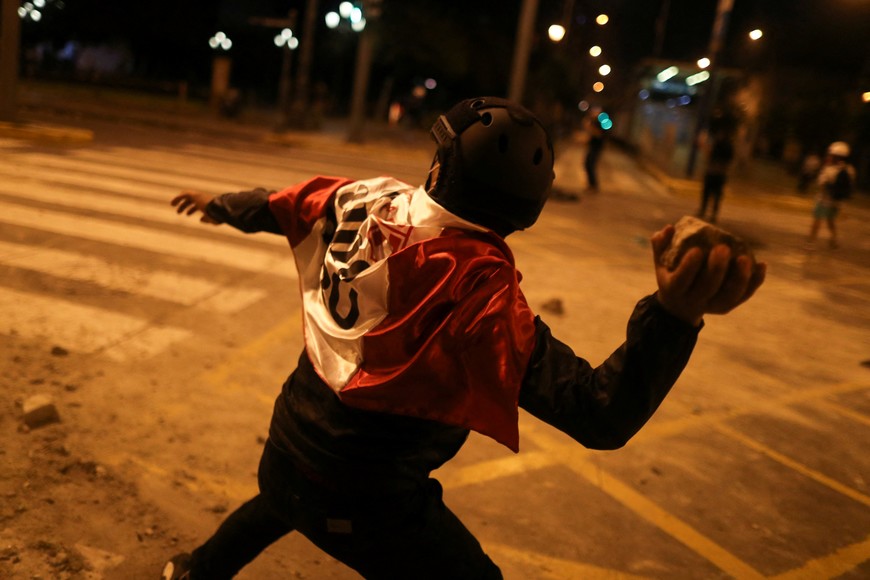 Demonstrators protest demanding the dissolution of Congress and to hold democratic elections rather than recognise Dina Boluarte as Peru's President, after the ousting of Peruvian President Pedro Castillo, in Lima, Peru December 12, 2022. REUTERS/Sebastian Castaneda