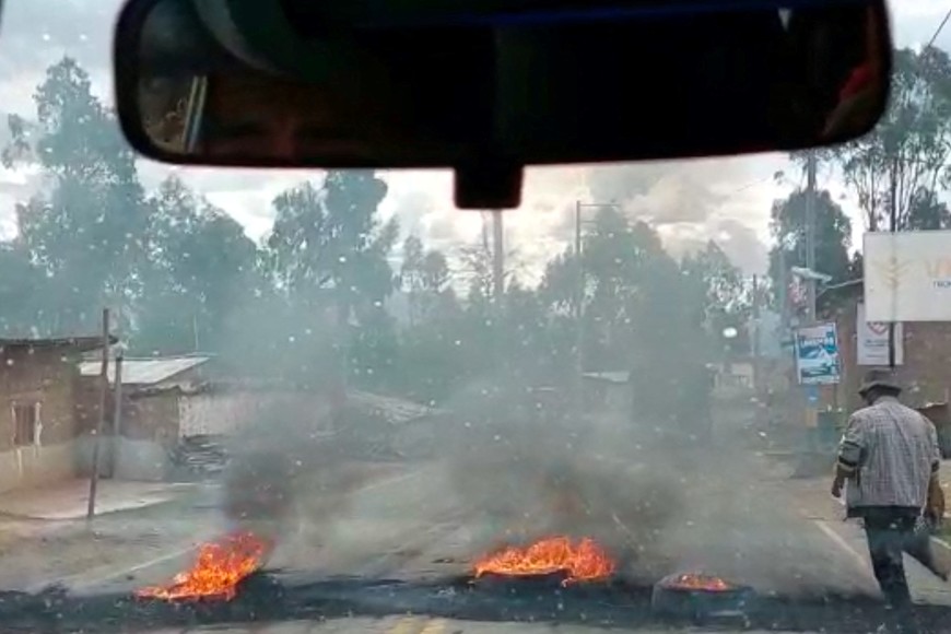 A barricade is seen from a vehicle during a protest in Andahuaylas, Peru December 9, 2022 as seen in this screen grab taken from a social media video. Melenia Diaz/via REUTERS  THIS IMAGE HAS BEEN SUPPLIED BY A THIRD PARTY. MANDATORY CREDIT. NO RESALES. NO ARCHIVES.