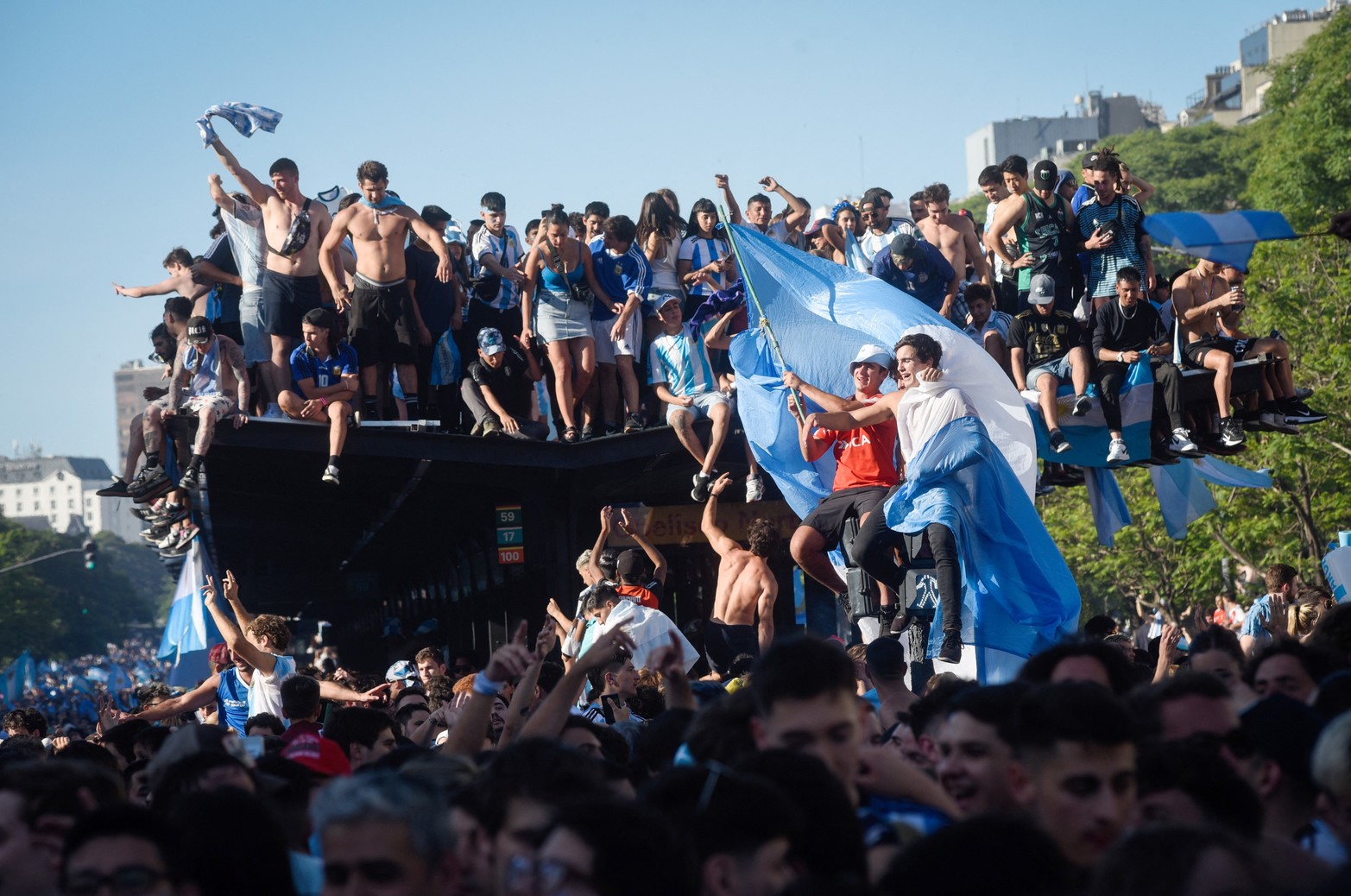 Soccer Football - FIFA World Cup Final Qatar 2022 - Fans in Buenos Aires - Buenos Aires, Argentina - December 18, 2022 
General view as Argentina fans celebrate after winning the World Cup by the Obelisco REUTERS/Mariana Nedelcu