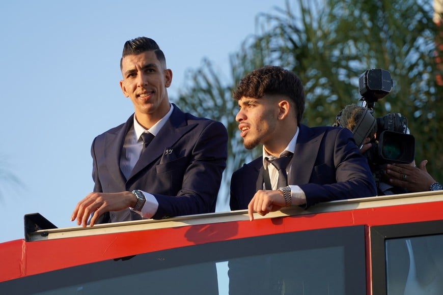 Soccer Football - FIFA World Cup Qatar 2022 - Morocco return after the World Cup - Rabat, Morocco - December 20, 2022
Morocco's Nayef Aguerd and Abde Ez  are pictured during the bus parade
REUTERS/Abdelhak Balhaki