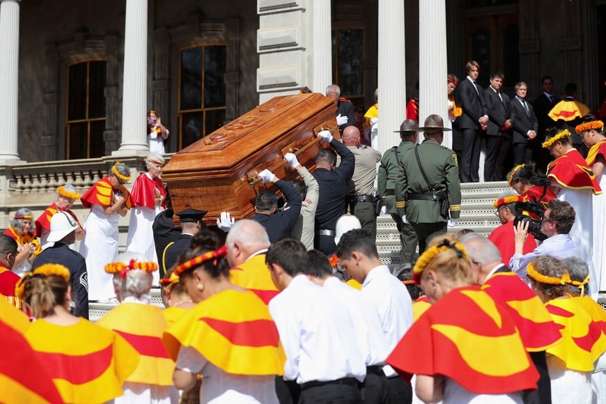 The casket of Abigail Kawananakoa, who died December 11, 2022 at the age of 96 and was considered a princess for her royal heritage, is carried into Iolani Palace where she will lie in state, in Honolulu, Hawaii, U.S. January 22, 2023. REUTERS/Marco Garcia