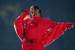 Feb 12, 2023; Glendale, Arizona, US; Recordist artist Rihanna performs during the halftime show of Super Bowl LVII at State Farm Stadium. Mandatory Credit: Kirby Lee-USA TODAY Sports