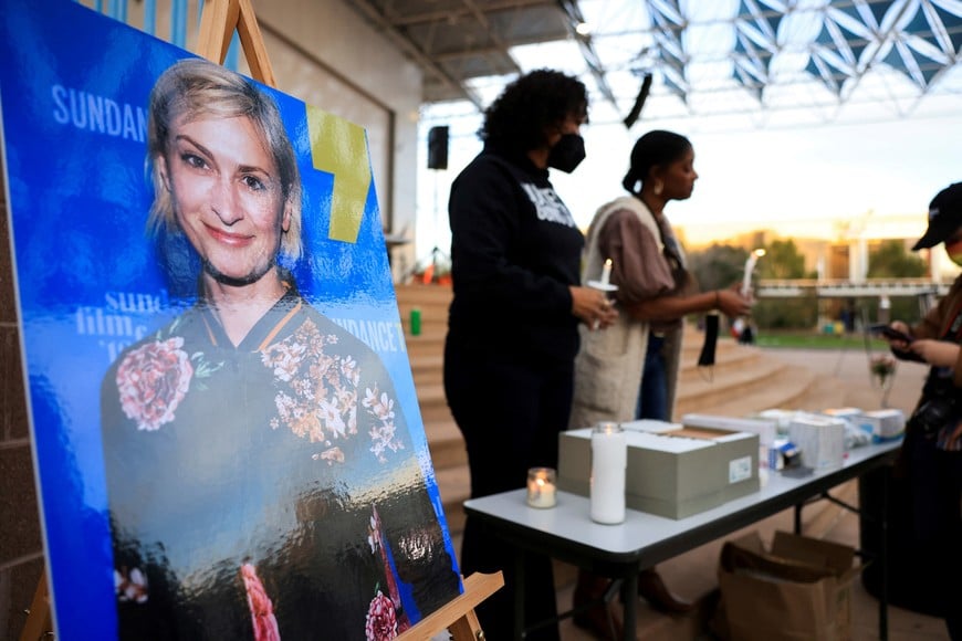 FILE PHOTO: An image of cinematographer Halyna Hutchins, who died after being shot by Alec Baldwin on the set of his movie "Rust", is displayed at a vigil in her honour in Albuquerque, New Mexico, U.S., October 23, 2021.  REUTERS/Kevin Mohatt/File Photo