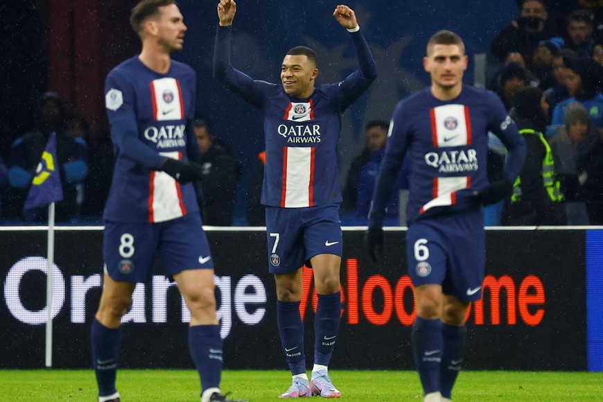 Soccer Football - Ligue 1 - Olympique de Marseille v Paris St Germain - Orange Velodrome, Marseille, France - February 26, 2023
Paris St Germain's Kylian Mbappe celebrates scoring their first goal with teammates REUTERS/Eric Gaillard