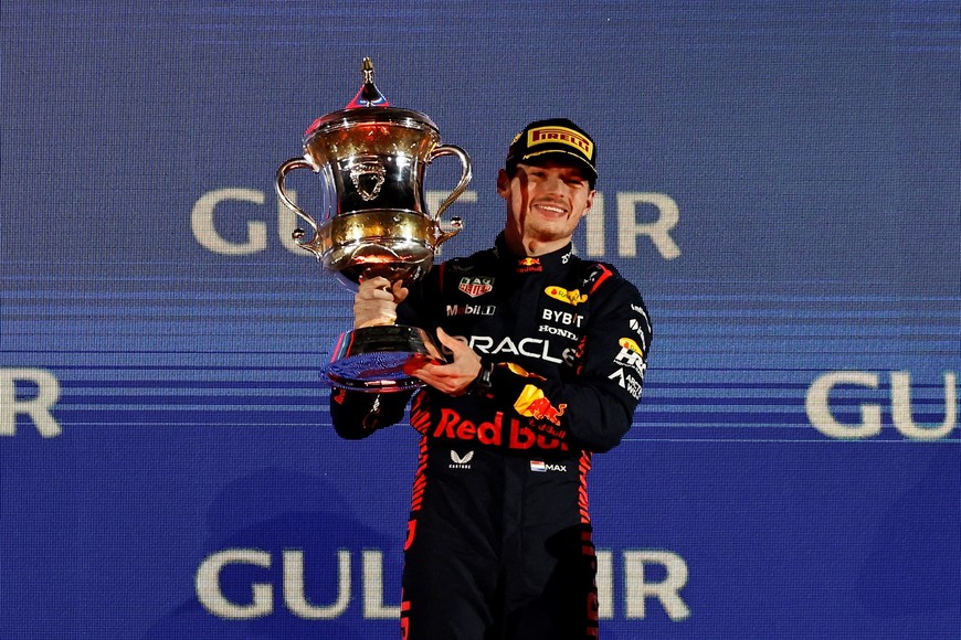 Formula One F1 - Bahrain Grand Prix - Bahrain International Circuit, Sakhir, Bahrain - March 5, 2023
Red Bull's Max Verstappen celebrates on the podium with a trophy after winning the Bahrain Grand Prix REUTERS/Hamad I Mohammed