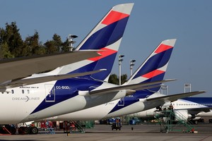 FILE PHOTO: LATAM Airlines planes are seen at Santiago International Airport, Chile March 30, 2017. REUTERS/Ivan Alvarado/File Photo                       GLOBAL BUSINESS WEEK AHEAD - SEARCH GLOBAL BUSINESS 15 MAY FOR ALL IMAGES santiago de chile  aviones de latam en el aeropuerto internacional de santiago aviones lineas aereas