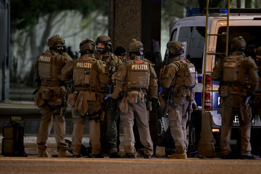 Special police gather after at least six people are dead and several more injured in a shooting in the northern German city of Hamburg, Germany, March 9, 2023.     REUTERS/Fabian Bimmer