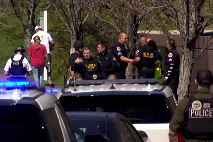 Law enforcement officers assemble near the Covenant School after a shooting in Nashville, Tennessee, U.S. March 27, 2023 in a still image from video.  WKRN/NewsNation via REUTERS.  NO RESALES. NO ARCHIVES
MANDATORY CREDIT