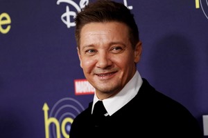 FILE PHOTO: Actor Jeremy Renner poses for a picture during the premiere of the television series Hawkeye at El Capitan theatre in Los Angeles, California, U.S. November, 17, 2021. REUTERS/Mario Anzuoni/File Photo