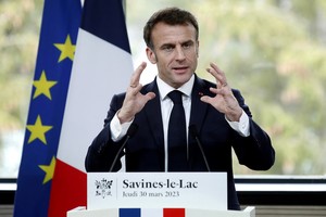 French President Emmanuel Macron delivers his speech during a meeting with local officials as part of his visit in Savines-Le-Lac, South Eastern France, March 30, 2023. Sebastien Nogier/Pool via REUTERS