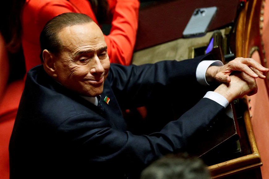 FILE PHOTO: Forza Italia leader and former Prime Minister Silvio Berlusconi sits in the upper house of parliament during the first voting session to elect the speaker of the Senate in Rome, Italy, October 13, 2022. REUTERS/Yara Nardi/File Photo