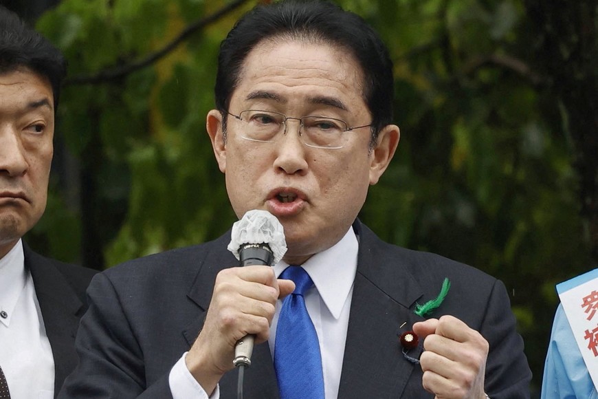 Japan's Prime Minister Fumio Kishida delivers a speech to support his ruling partyÕs candidate in a local election, near a train station in Wakayama, Wakayama Prefecture, south-western Japan April 15, 2023, in this photo released by Kyodo. Mandatory credit Kyodo via REUTERS ATTENTION EDITORS - THIS IMAGE WAS PROVIDED BY A THIRD PARTY. MANDATORY CREDIT. JAPAN OUT. NO COMMERCIAL OR EDITORIAL SALES IN JAPAN. THIS IMAGE WAS PROCESSED BY REUTERS TO ENHANCE QUALITY, AN UNPROCESSED VERSION HAS BEEN PROVIDED SEPARATELY.