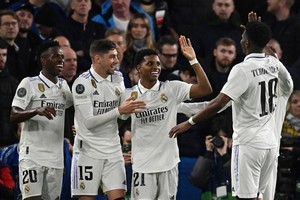 Soccer Football - Champions League - Quarter Final - Second Leg - Chelsea v Real Madrid - Stamford Bridge, London, Britain - April 18, 2023
Real Madrid's Rodrygo celebrates scoring their second goal with Vinicius Junior, Federico Valverde and Aurelien Tchouameni REUTERS/Dylan Martinez