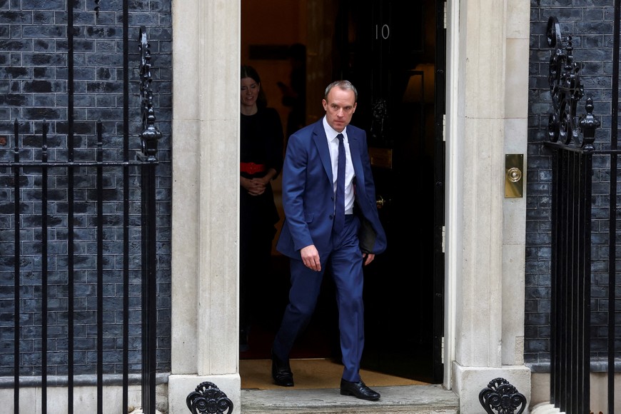 FILE PHOTO: British Deputy Prime Minister and Justice Secretary Dominic Raab exits Number 10 Downing Street, on the day of a cabinet meeting, in London, Britain, October 26, 2022. REUTERS/Hannah Mckay/File Photo