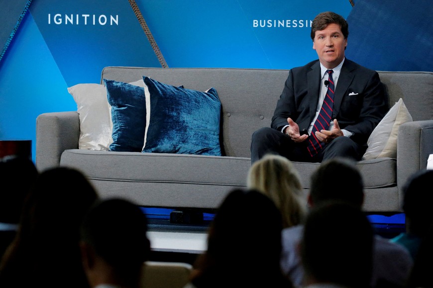 FILE PHOTO: Fox personality Tucker Carlson speaks at the 2017 Business Insider Ignition: Future of Media conference in New York, U.S., November 30, 2017.  REUTERS/Lucas Jackson/ File Photo