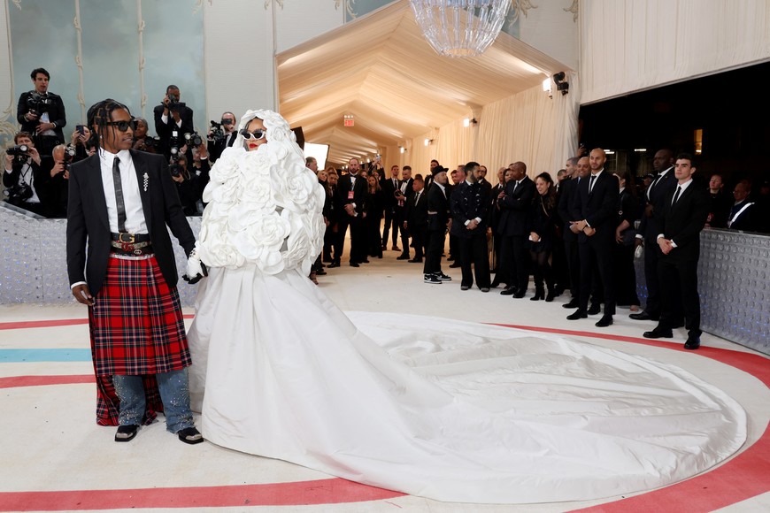 Rihanna and ASAP Rocky pose at the Met Gala, an annual fundraising gala held for the benefit of the Metropolitan Museum of Art's Costume Institute with this year's theme "Karl Lagerfeld: A Line of Beauty", in New York City, New York, U.S., May 1, 2023. REUTERS/Andrew Kelly