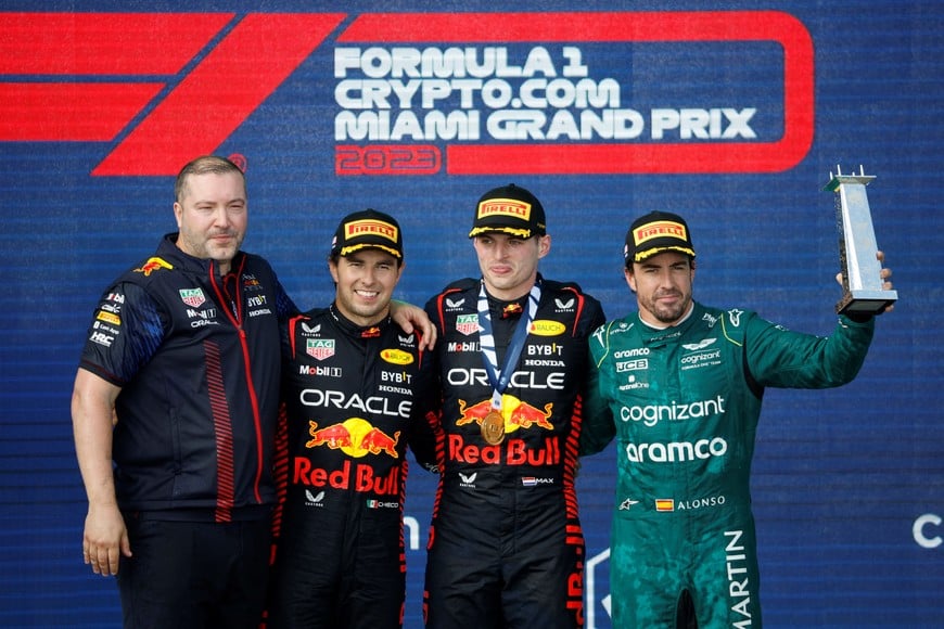 Formula One F1 - Miami Grand Prix - Miami International Autodrome, Miami, Florida, U.S. - May 7, 2023
First placed Red Bull's Max Verstappen, second placed Red Bull's Sergio Perez and third placed Aston Martin's Fernando Alonso celebrate on the podium after the race REUTERS/Marco Bello