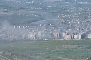 Smoke erupts following a shell explosion, amid Russia's attack on Ukraine, in Bakhmut, Donetsk region, Ukraine in this screengrab obtained from a handout video released on May 7, 2023. Adam Tactic Group/Handout via REUTERS. THIS IMAGE HAS BEEN SUPPLIED BY A THIRD PARTY