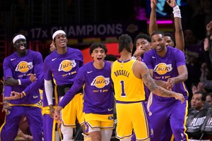 May 12, 2023; Los Angeles, California, USA; Los Angeles Lakers celebrates after a 3 point basket by guard D'Angelo Russell (1) in the second half of game six of the 2023 NBA playoffs Golden State Warriors at Crypto.com Arena. Mandatory Credit: Jayne Kamin-Oncea-USA TODAY Sports