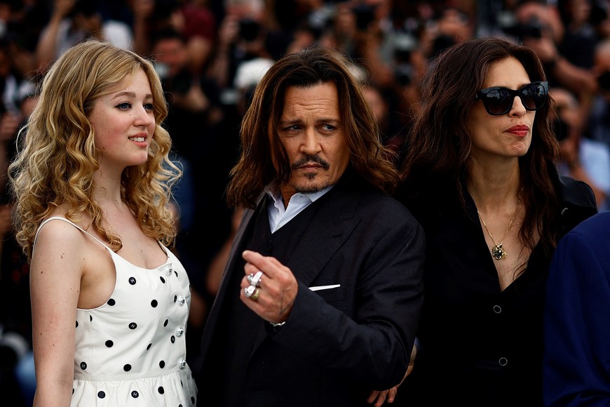 The 76th Cannes Film Festival - Photocall for the film "Jeanne du Barry " Out of competition - Cannes, France, May 17, 2023. Director Maiwenn and cast members Pauline Pollmann and Johnny Depp pose. REUTERS/Sarah Meyssonnier