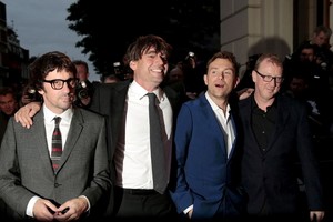 FILE PHOTO: Graham Coxon, Alex James, Damon Albarn and Dave Rowntree (L-R) of the band Blur arrive for the GQ Men of the Year Awards at the Royal Opera House in London, Britain September 8, 2015.