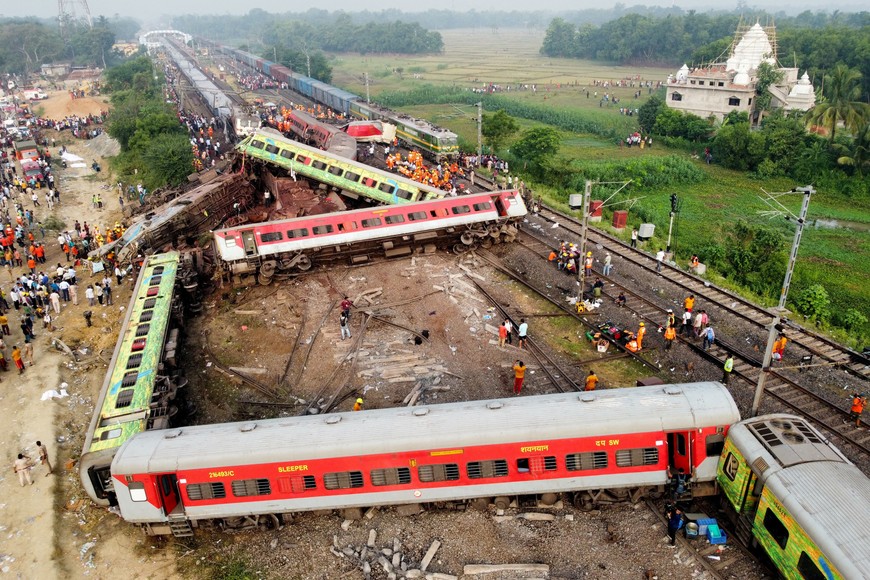 A drone view shows derailed coaches after two passenger trains collided in Balasore district in the eastern state of Odisha, India, June 3, 2023. REUTERS/Stringer NO RESALES. NO ARCHIVES.     TPX IMAGES OF THE DAY