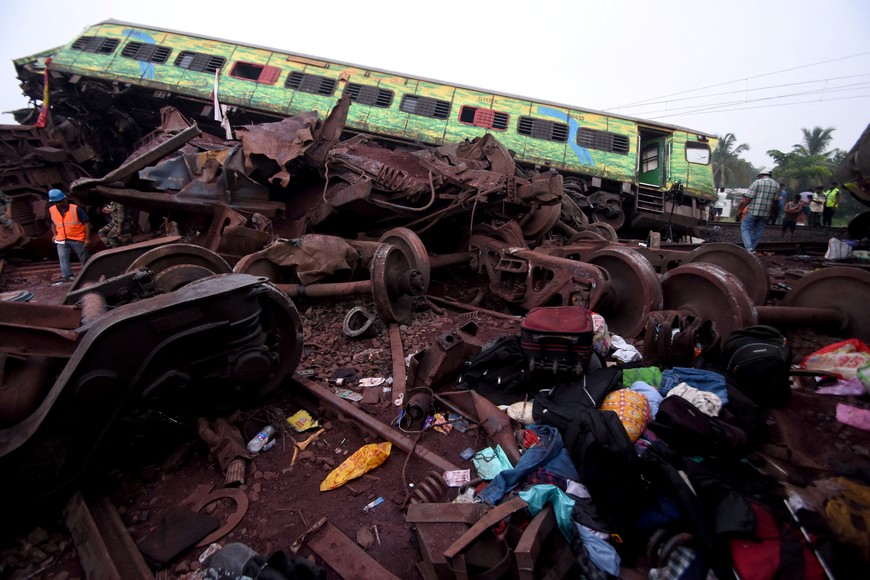 Belongings of passengers lie next to a damaged coach after a deadly collision of trains, in Balasore district, in the eastern state of Odisha, India, June 3, 2023. REUTERS/Stringer NO RESALES. NO ARCHIVES.     TPX IMAGES OF THE DAY