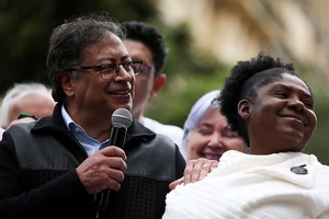 Colombia's President Gustavo Petro speaks next to Vice President Francia Marquez as people attend a march in support of his government's proposed health, retirement, employment and prison reforms in Bogota, Colombia, June 7, 2023. REUTERS/Luisa Gonzalez