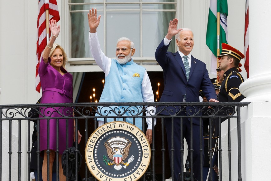 U.S. first lady Jill Biden, India’s Prime Minister Narendra Modi and U.S. President Joe Biden wave to the crowd as they stand on the Truman Balcony of the White House after an official State Arrival Ceremony held at the start of Modi's visit to the White House in Washington, U.S., June 22, 2023. REUTERS/Jonathan Ernst