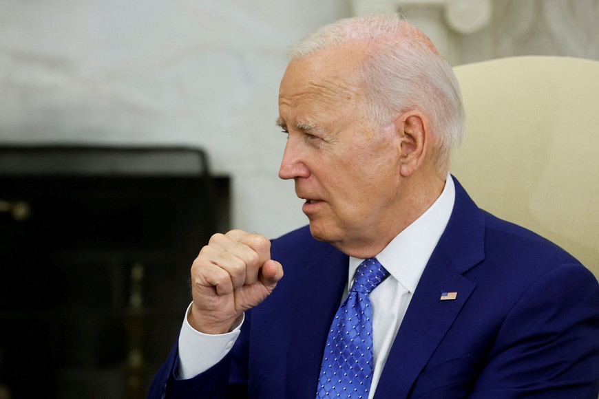 U.S. President Joe Biden reacts while meeting with Swedish Prime Minister Ulf Kristersson (not pictured) in the Oval Office, at the White House in Washington, U.S., July 5, 2023.  REUTERS/Jonathan Ernst