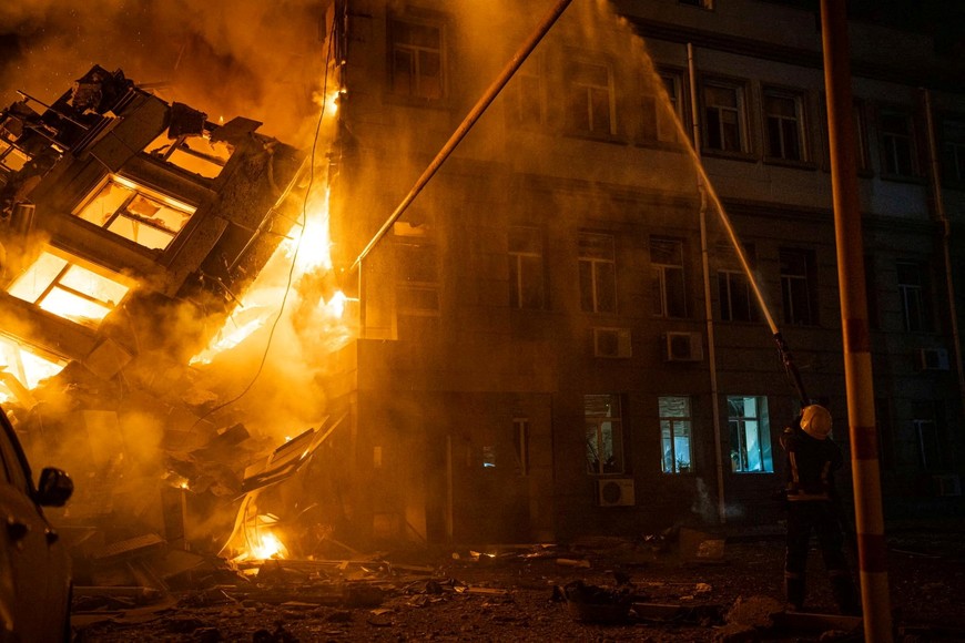 A firefighter works at a site of an administrative building heavily damaged by a Russian missile strike, amid Russia's attack on Ukraine, in Odesa, Ukraine July 20, 2023. Press service of the State Emergency Service of Ukraine/Handout via REUTERS ATTENTION EDITORS - THIS IMAGE HAS BEEN SUPPLIED BY A THIRD PARTY.
