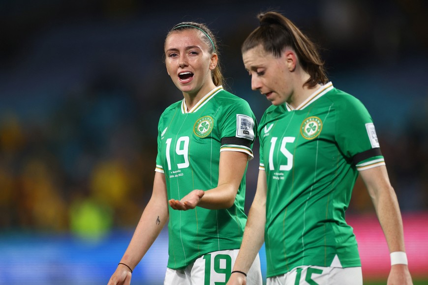 Soccer Football - FIFA Women’s World Cup Australia and New Zealand 2023 - Group B - Australia v Republic of Ireland - Stadium Australia, Sydney, Australia - July 20, 2023
Republic of Ireland's Abbie Larkin and Lucy Quinn look dejected after the match REUTERS/Carl Recine