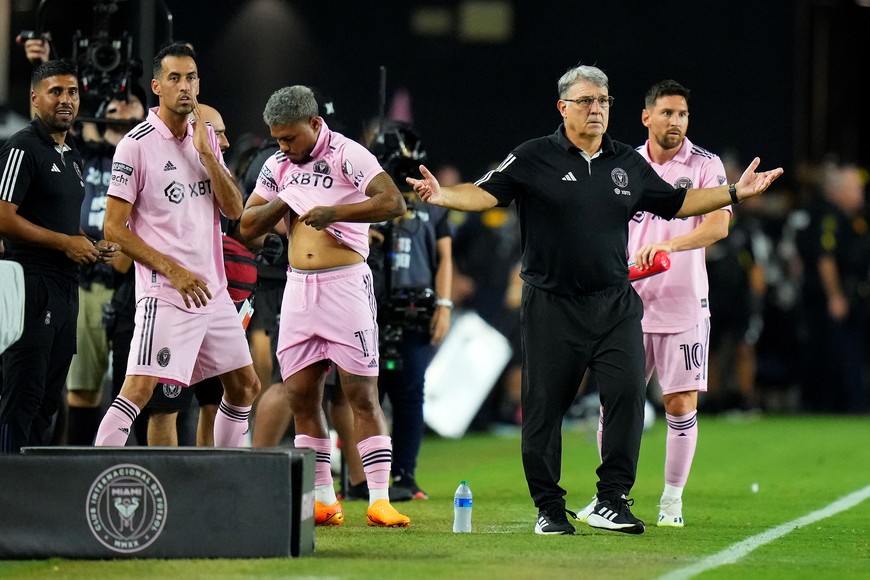 Jul 21, 2023; Fort Lauderdale, FL, USA; Inter Miami CF manager Gerardo Martino with forward Lionel Messi (10) midfielder Sergio Busquets (5) and  forward Josef Martinez (17) during the second half at DRV PNK Stadium. Mandatory Credit: Rich Storry-USA TODAY Sports