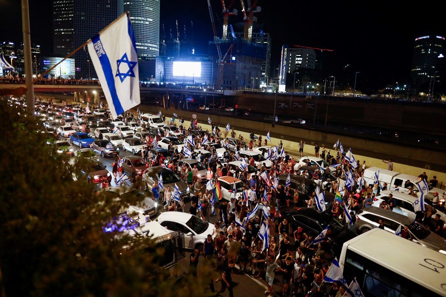 Protesters block part of Ayalon Highway during a demonstration following a parliament vote on a contested bill that limits Supreme Court powers to void some government decisions, in Tel Aviv, Israel July 24, 2023. REUTERS/Corinna Kern