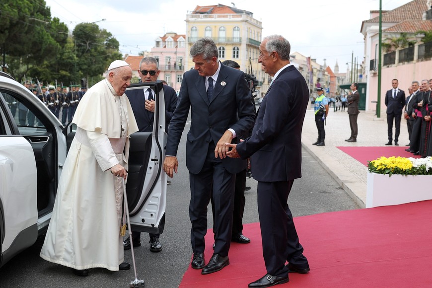 Pope Francis is welcomed by Portugal's President Marcelo Rebelo de Sousa (R) in front of the Belem Palace in Lisbon, Portugal, 02 August 2023. The Pontiff will be in Portugal on the occasion of World Youth Day (WYD), one of the main events of the Church that gathers the Pope with youngsters from around the world, that takes place until 06 August. Tiago Petinga/Pool via REUTERS