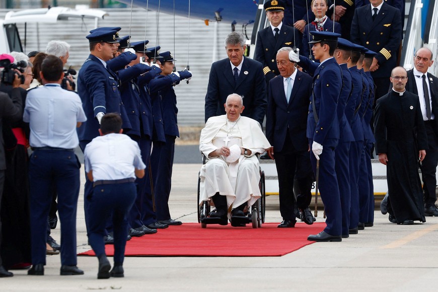 Pope Francis arrives at Figo Maduro Air Base during his apostolic journey to Portugal on the occasion of the XXXVII World Youth Day, in Lisbon, Portugal, August 2, 2023. REUTERS/Guglielmo Mangiapane