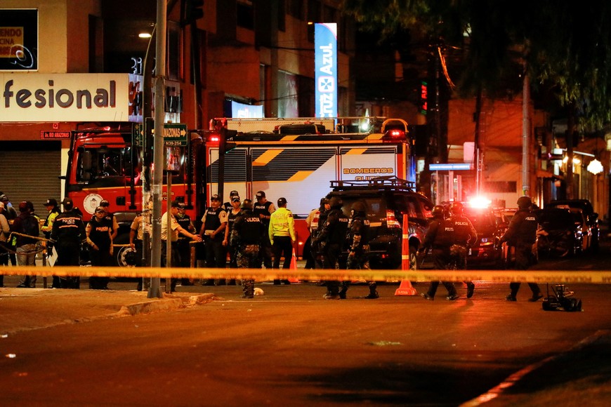 Police officers work outside the rally site where Ecuadorean presidential candidate Fernando Villavicencio was killed at a campaign event in Quito, Ecuador August 9, 2023. REUTERS/Karen Toro