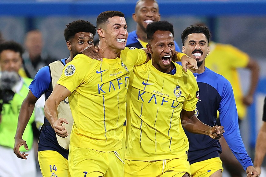 Soccer Football - Arab Club Champions Cup - Final - Al Hilal v Al Nassr - King Fahd Stadium, Taif, Saudi Arabia - August 12, 2023
Al Nassr's Cristiano Ronaldo celebrates with teammates after winning the Arab Club Champions Cup final 
REUTERS/Stringer
TPX IMAGES OF THE DAY