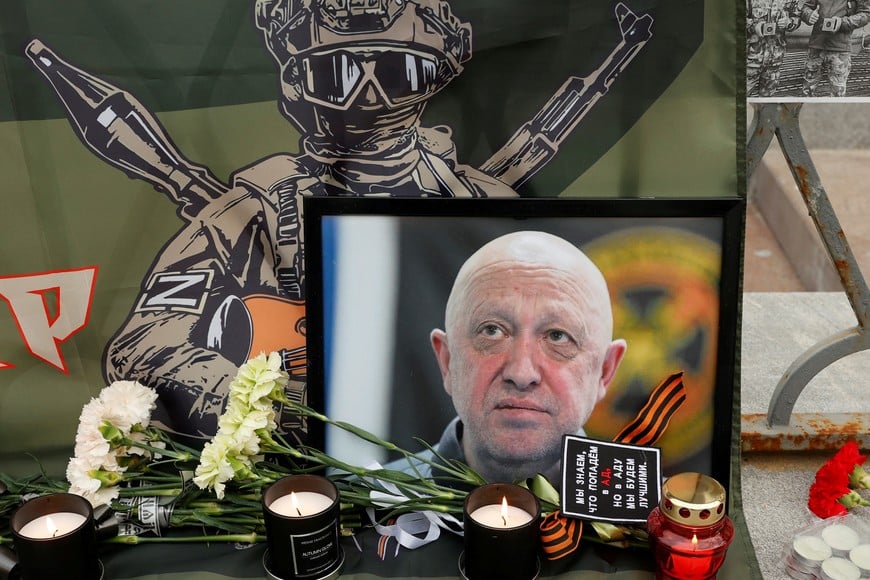 A view shows a portrait of Wagner mercenary chief Yevgeny Prigozhin at a makeshift memorial in Moscow, Russia August 24, 2023. REUTERS/Stringer