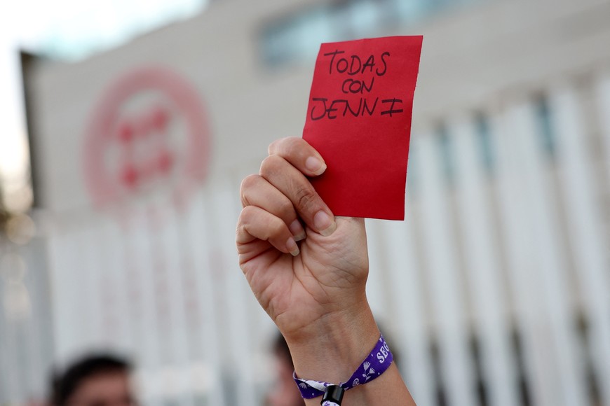 Soccer Football - People protest outside the Spanish Soccer Federation - Ciudad Del Futbol Las Rozas, Las Rozas, Spain - August 25, 2023 
General view as a red card is held up as they protest against President of the Royal Spanish Football Federation Luis Rubiales REUTERS/Isabel Infantes